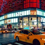 time lapse phot oof a yellow car